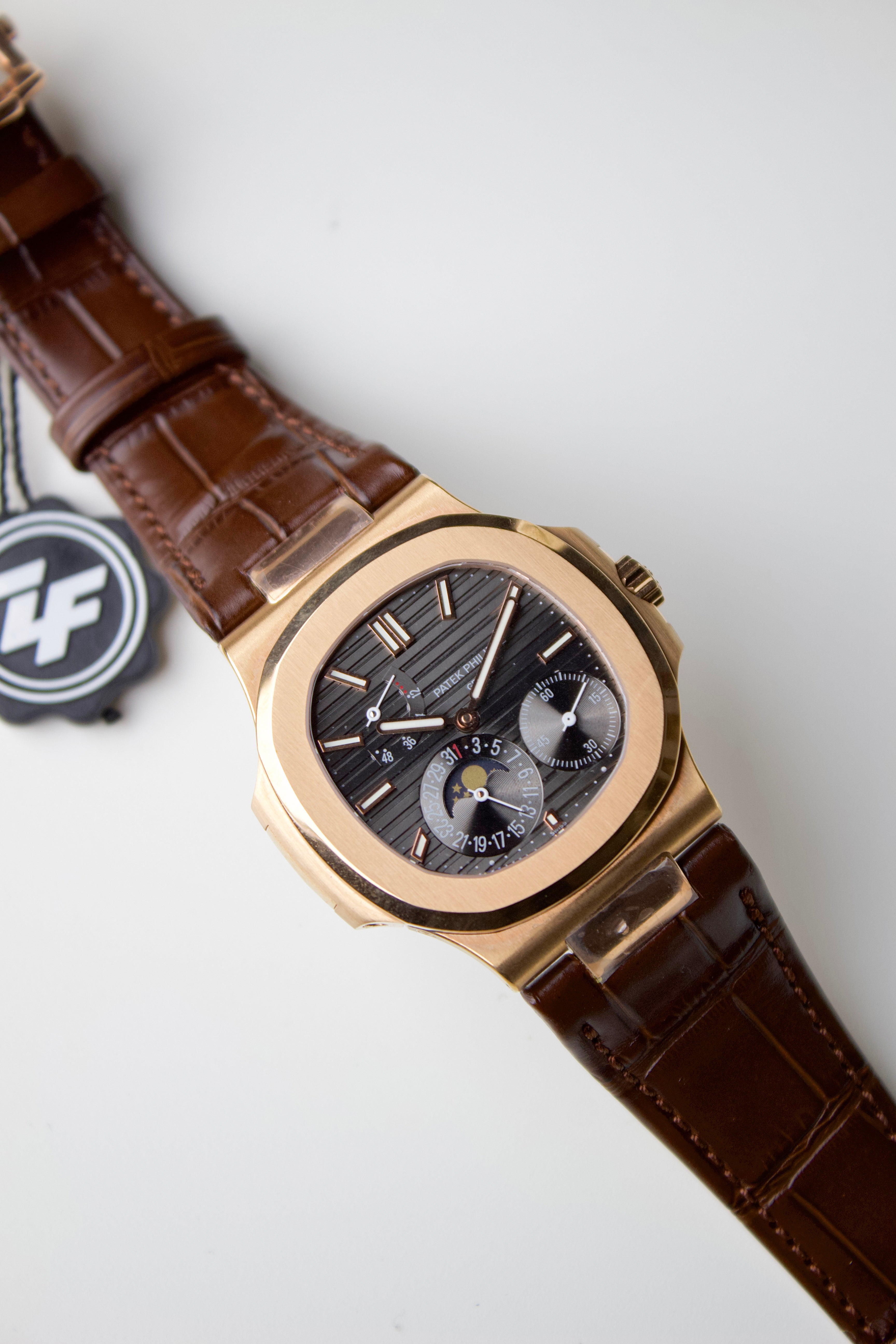 PATEK PHILIPPE NAUTILUS MOON PHASE WITH BLACK-GRADIENT DIAL