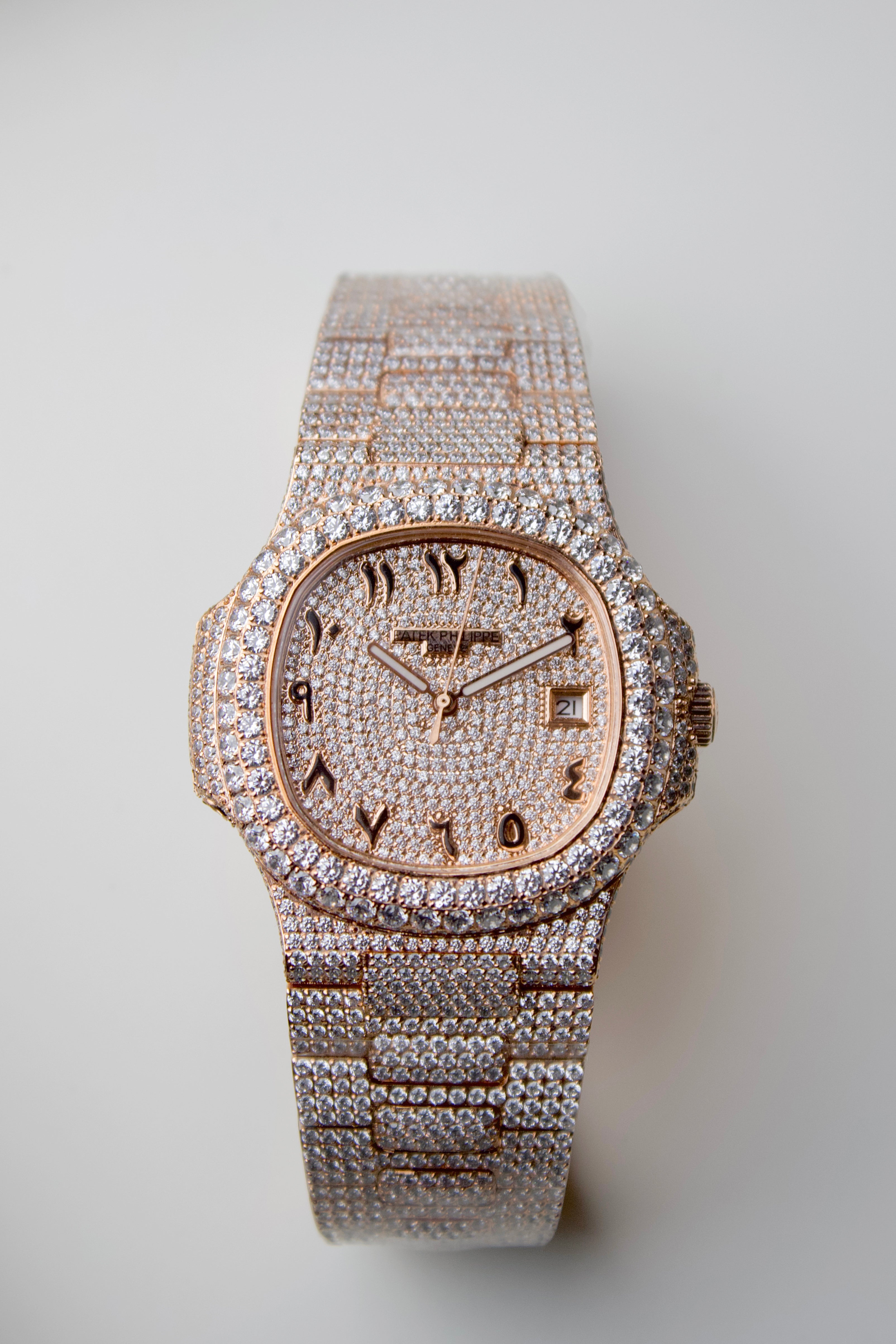 ATEK PHILIPPE NAUTILUS WITH DIAMOND-PAVÉ DIAL AND ARABIC NUMERALS