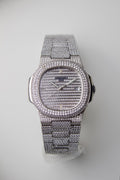 PATEK PHILIPPE NAUTILUS WITH DIAMOND-SET HORIZONTAL EMBOSSED DIAL