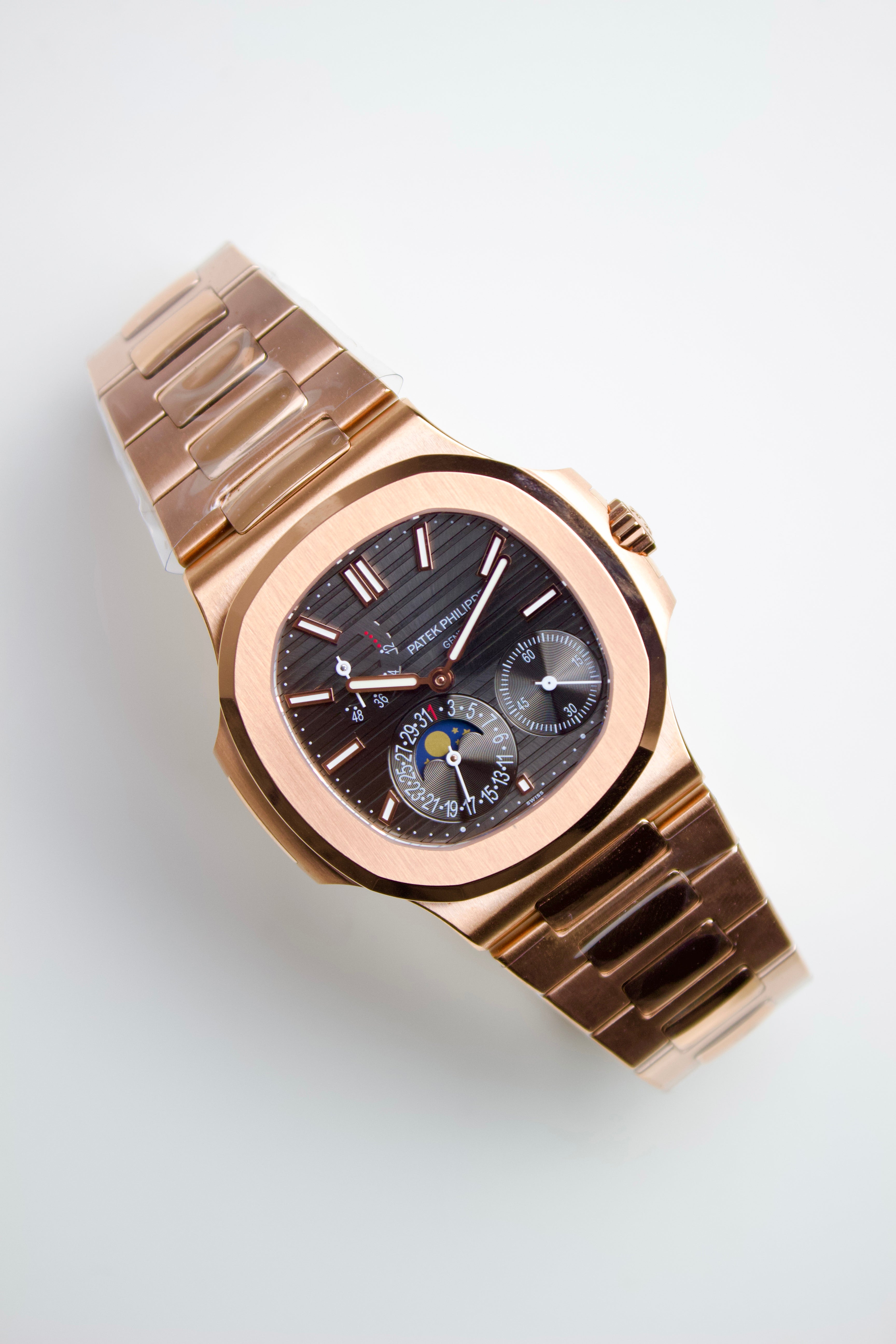 PATEK PHILIPPE NAUTILUS 5712R MOON PHASE ROSE GOLD BLACK DIAL