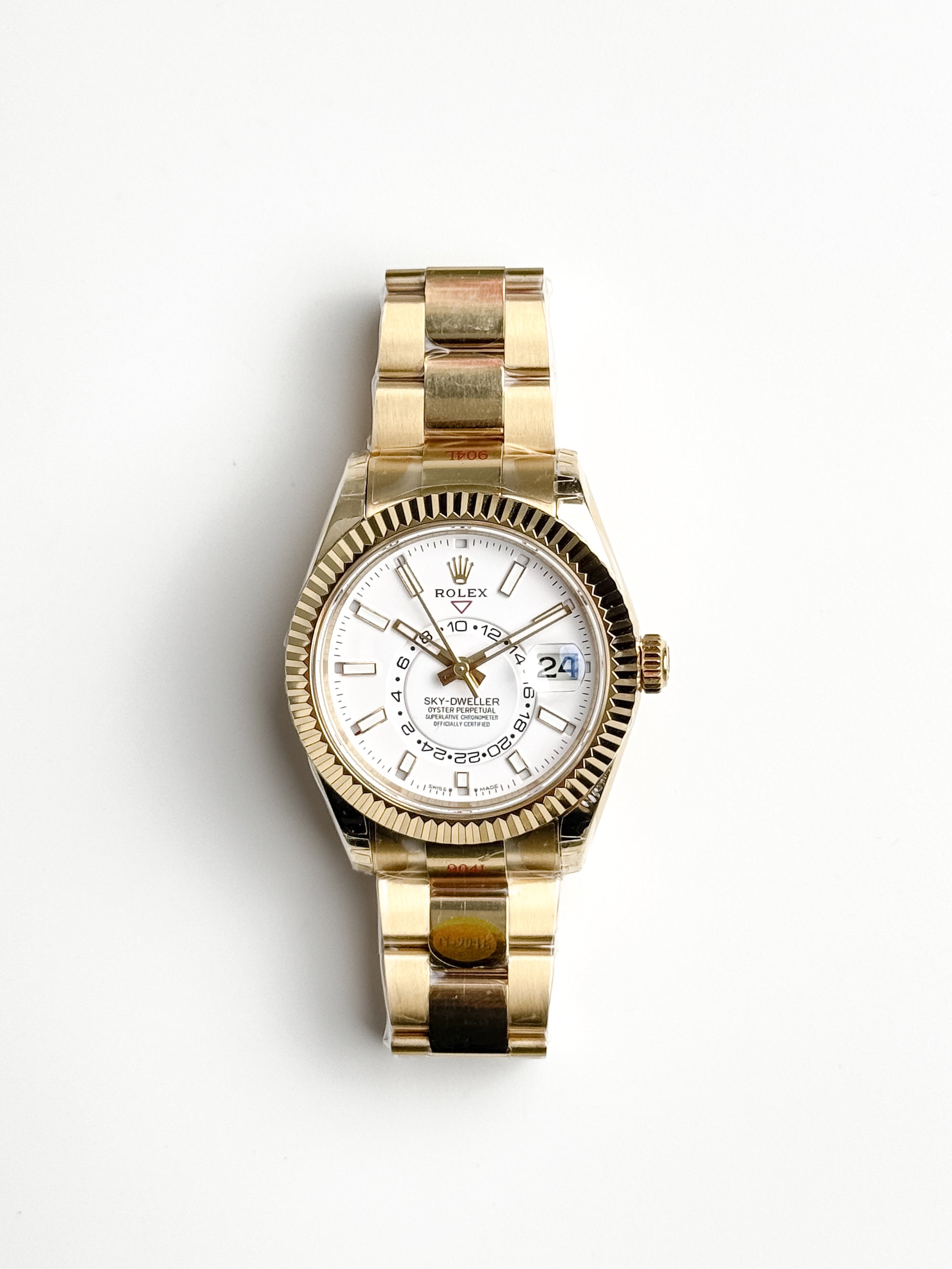 ROLEX SKY-DWELLER IN 18CT YELLOW GOLD WITH WHITE DIAL