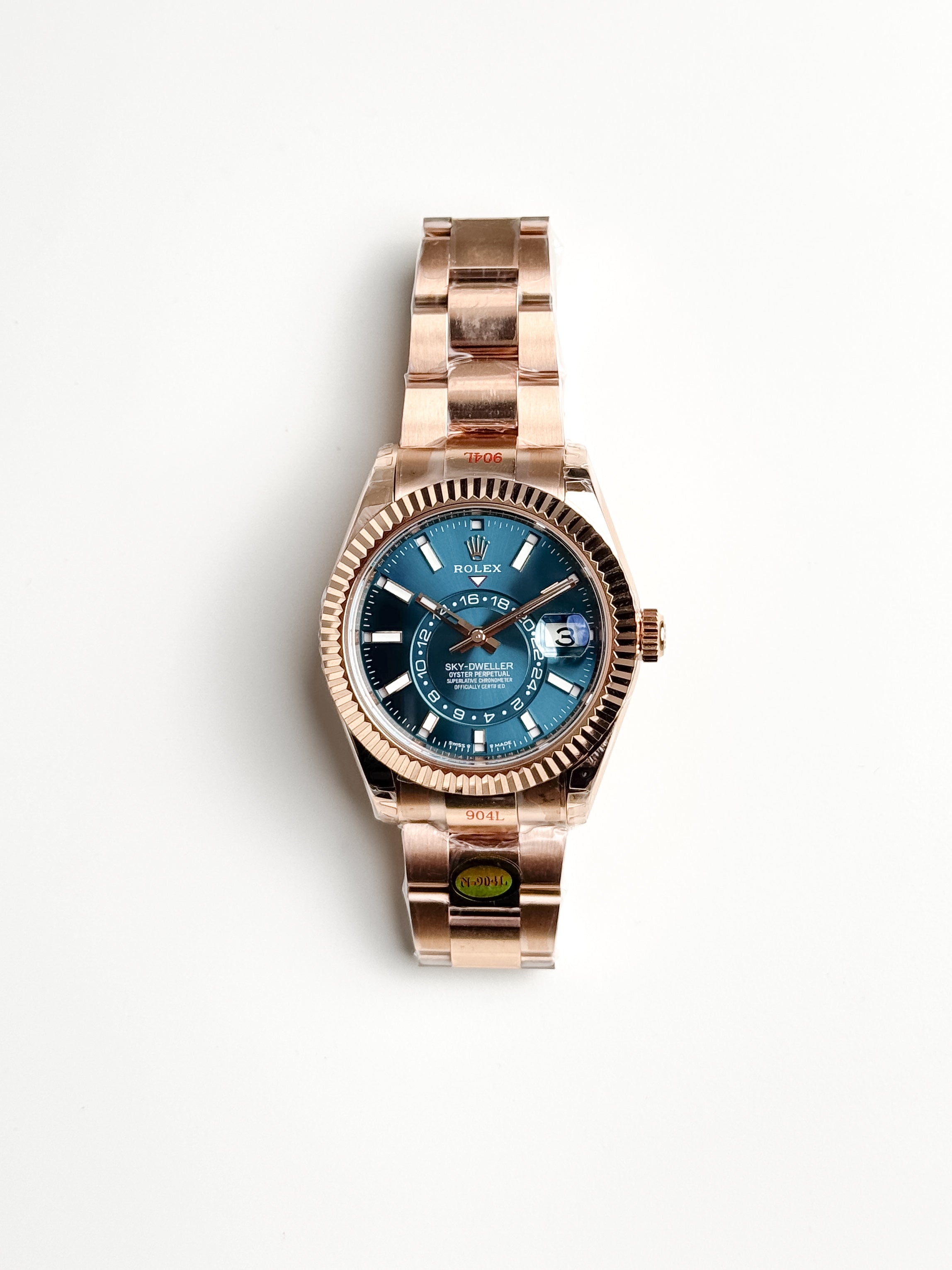 ROLEX OYSTER PERPETUAL SKY-DWELLER IN EVEROSE GOLD WITH BLUE-GREEN DIAL